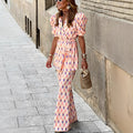 AVA | CONJUNTO ESTAMPADO COM BLAZER E CALÇAS À BOCA DE SINO